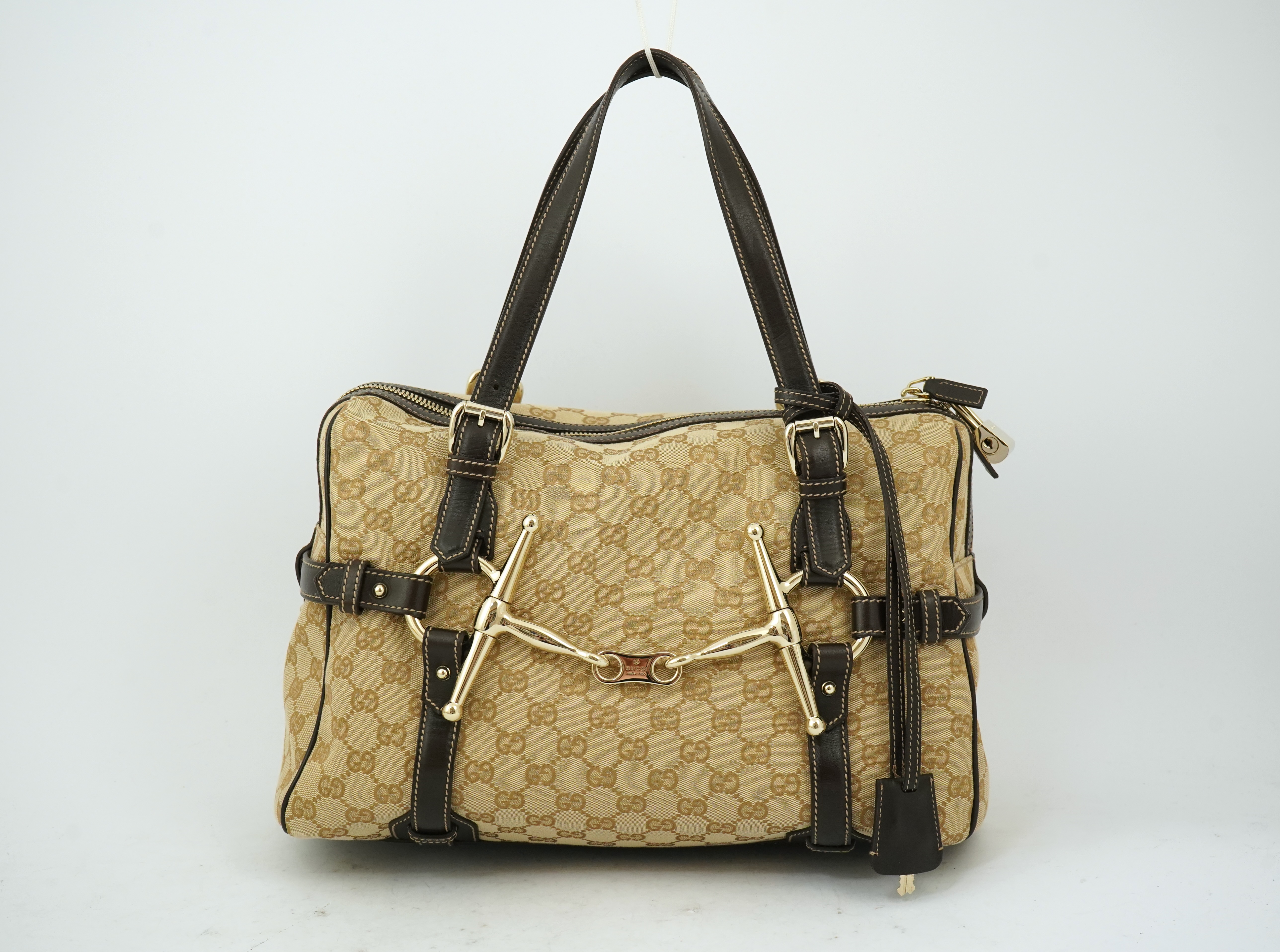 A vintage Gucci GG Classic Monogram Horsebit Shoulder Bag